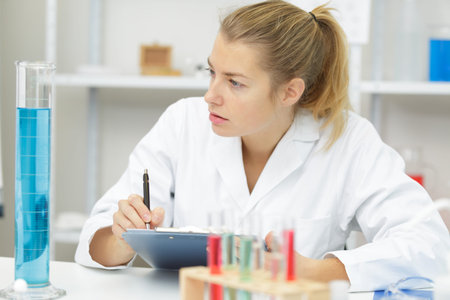 laboratory technician observation on test tube