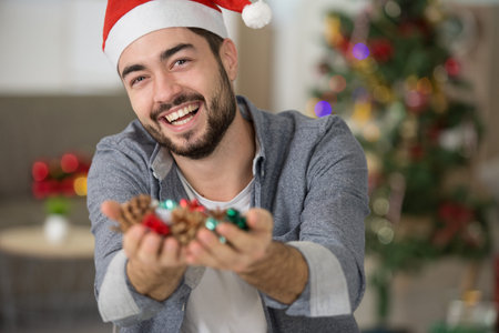 happy christmas guys wearing a santa hat