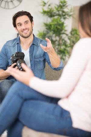 photographer giving instructions to model