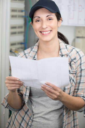 woman builder smiling at the cameraの写真素材