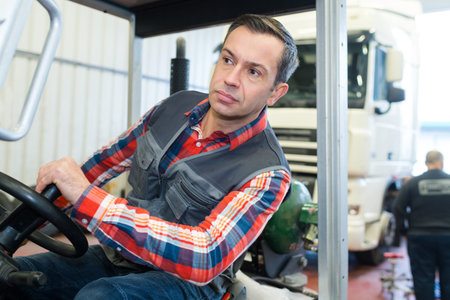 heavy equipment mechanic driving