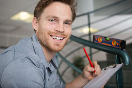 a smiling worker at workの写真素材