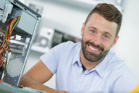 small business owner of a computer repair storeの写真素材