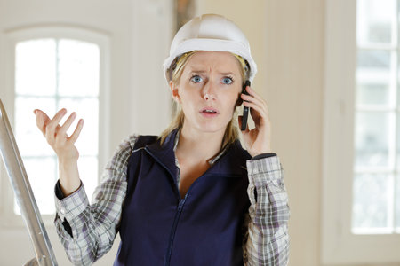 an angry business woman architect on the phone