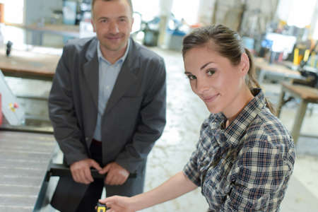 workers in a small businessの写真素材