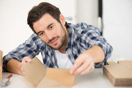 worker making boxesの写真素材