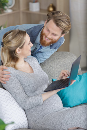 young couple expecting a baby online