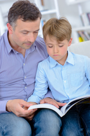 dad and his son reading a story