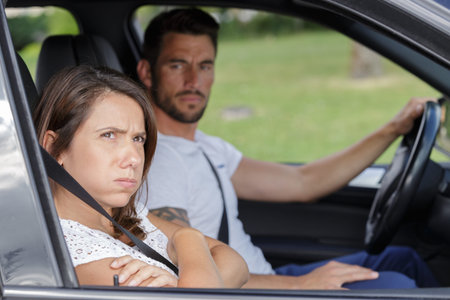 couple having a serious talk in a car