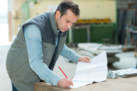 portrait of manager at factoryの写真素材