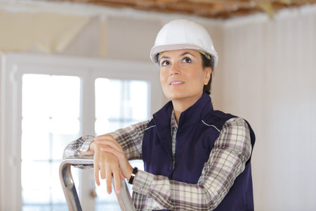 a woman builder in uniform