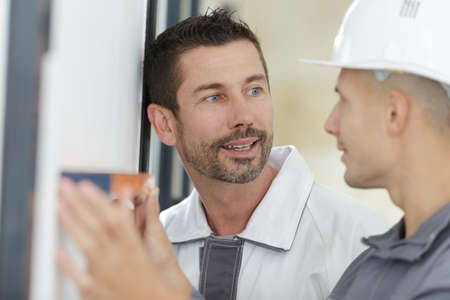 the two painters working indoorsの写真素材