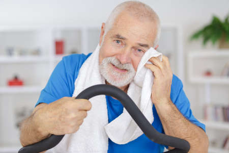 handsome senior man after doing cardio work outの写真素材