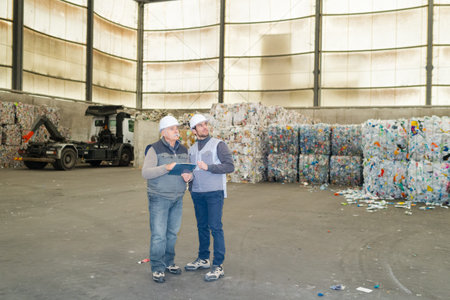 industrial engineers working in recycling plantの写真素材