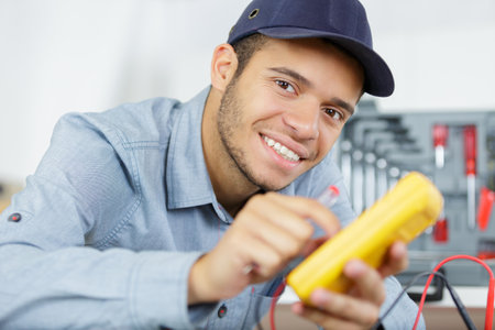 electrician working safely on electrical systemの写真素材
