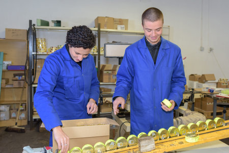 workers in the canning factory