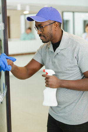 man is a cleaner in a hospital cleansing equipmentの写真素材