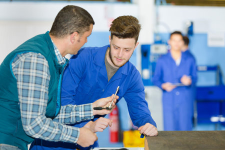 young woman working in a mechanic shop