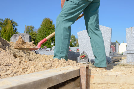 portrait of man digging a graveの写真素材