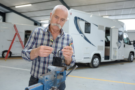 a campervan mechanic at workの写真素材