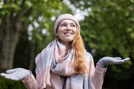 young woman winter portrait in park