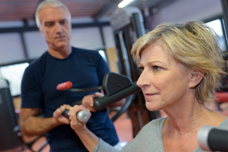 elderly woman in the gym for rehabilitationの写真素材