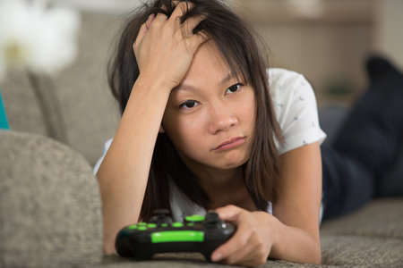 upset female friend lost a gameの写真素材