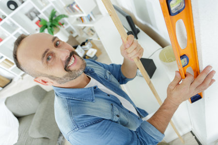 floorer working in home in improvement projectの写真素材