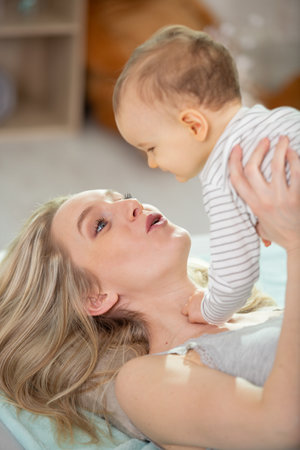 the mother kisses the babyの写真素材