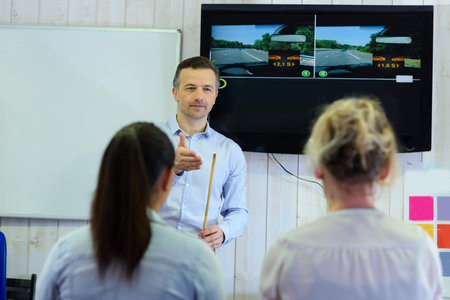 driving instructor explains road theory