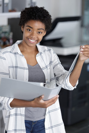 happy woman with a folder