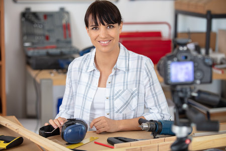 happy woman in industrial blogging conceptの写真素材