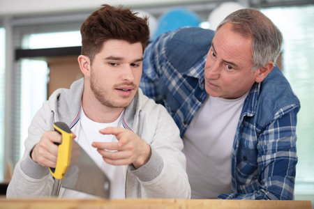 two men is working planer