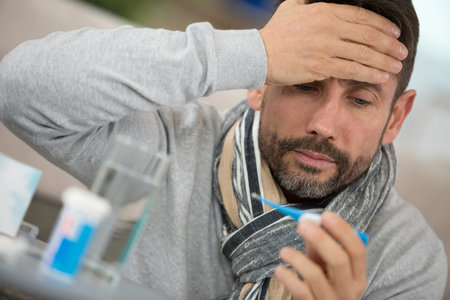 man with fever
