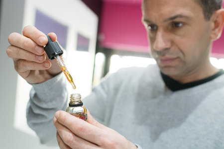 portrait of man buying essential oil