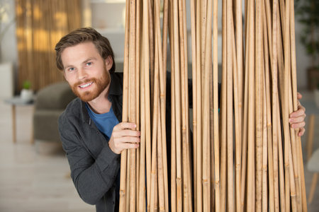 young man working as a moverの写真素材