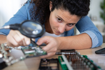 woman using a magnifying glass