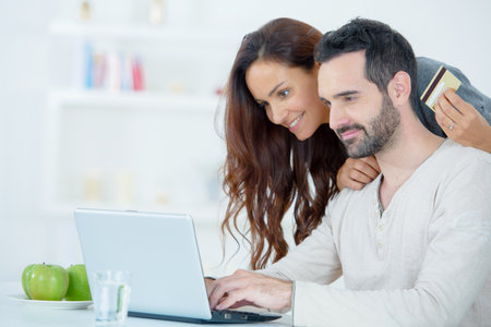 a couple shopping onlineの写真素材