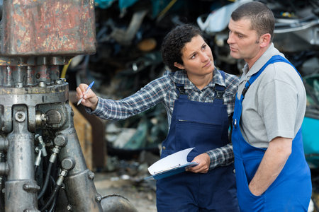 engineers working on machinery