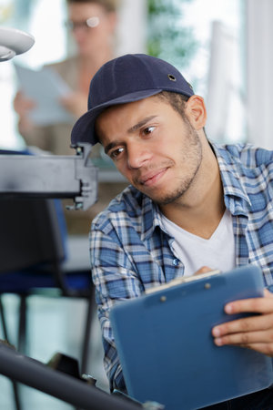 a technician man monitoring something