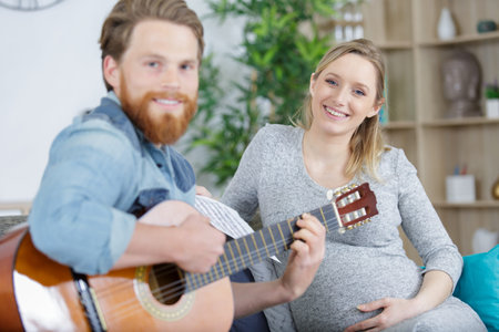 mom and dad play musicの写真素材