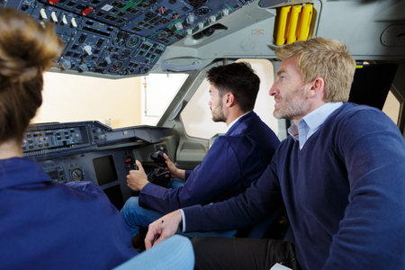 portrait of engineers in control panel