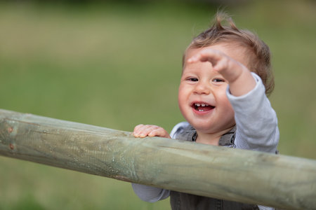 little young caucasian boy in nature childhoodの写真素材