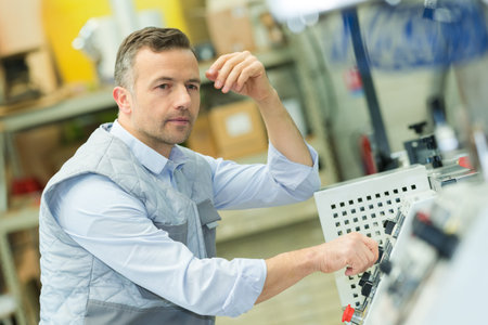 portrait of man printer factory