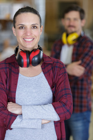 happy successful female worker of factoryの写真素材