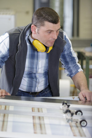 worker in a workshop with machines