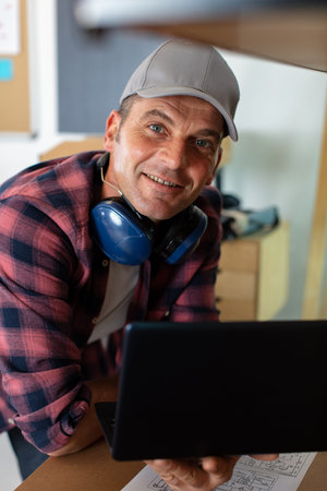 happy smiling worker using pc