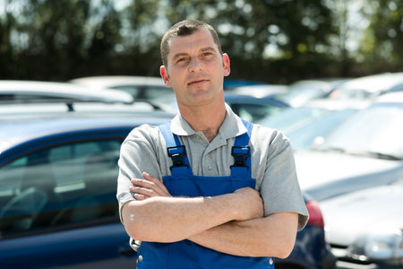 portrait of a mechanic man outdoors