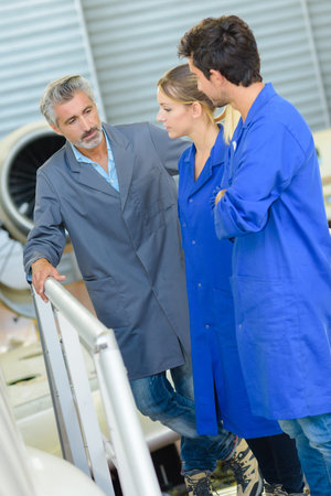 portrait of apprentices during production outdoors