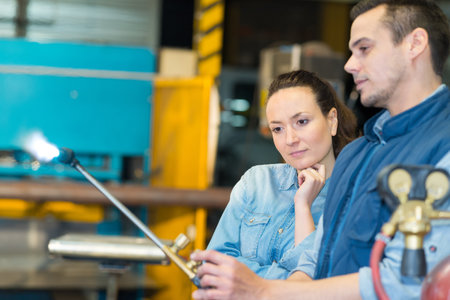 demonstrating the welding rod usesの写真素材